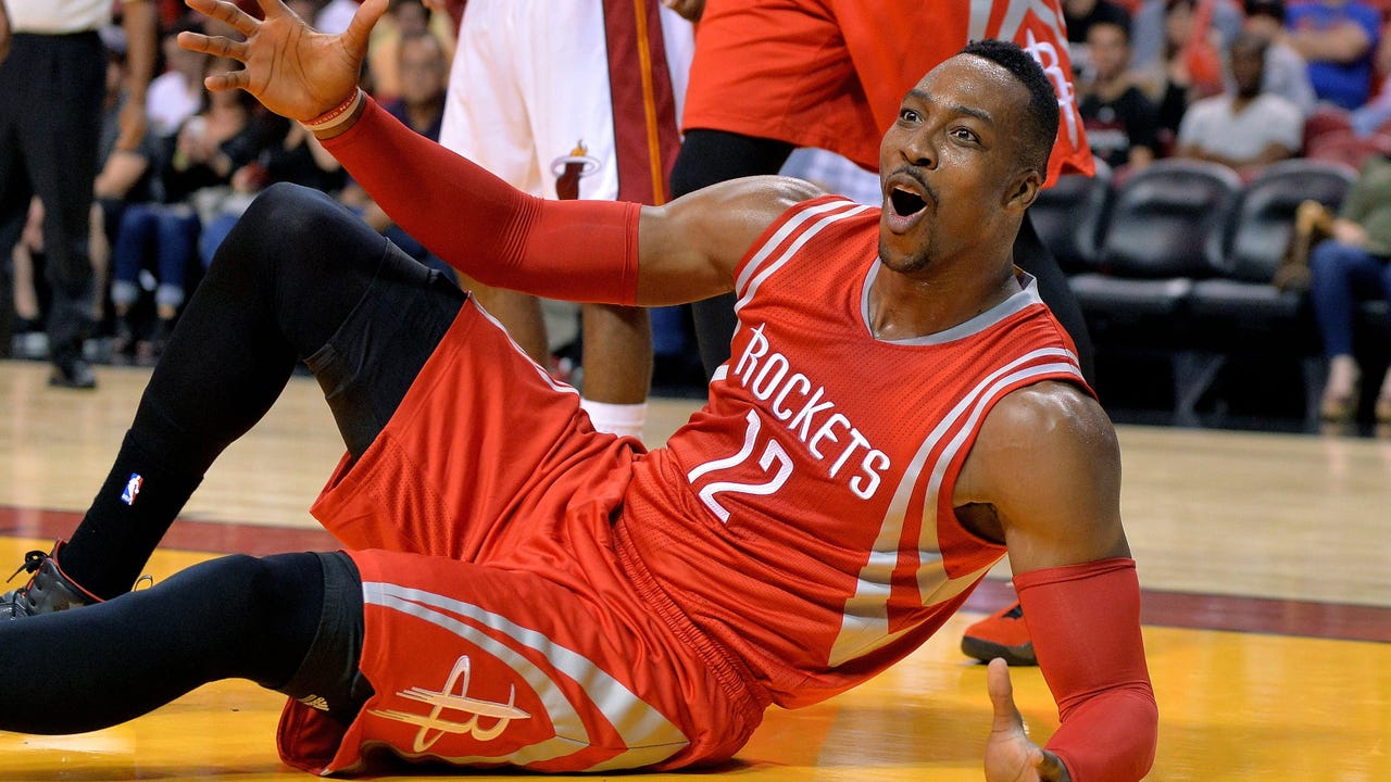 Wade leads late charge, Heat top Rockets